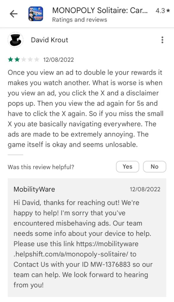 Captura de pantalla de una revisión de la aplicación de juego Monopoly Solitaire de dos estrellas con una respuesta del desarrollador de la aplicación