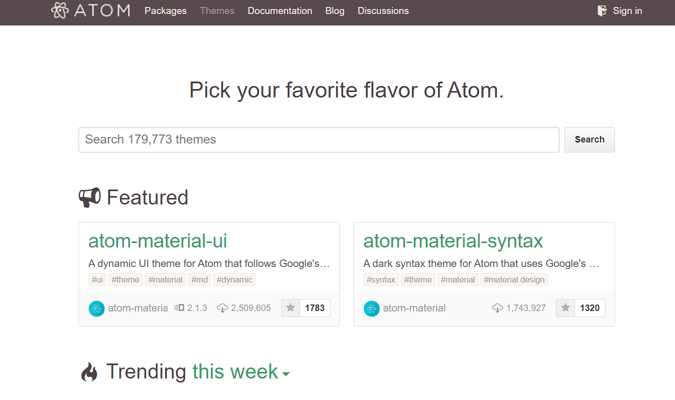 Captura de pantalla de la página web de Atom con el título que dice "Elige tu sabor Atom favorito" y la barra de búsqueda para buscar 179,773 temas